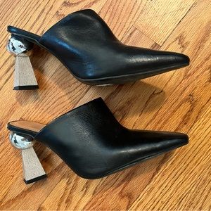 Jonak. Mules. Size EU 40. Black leather with gold ball and blonde wood heels.
